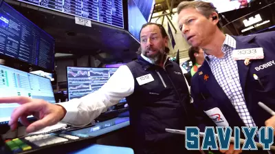 Dow soars 1,000 points, Caterpillar & Under Armour jump